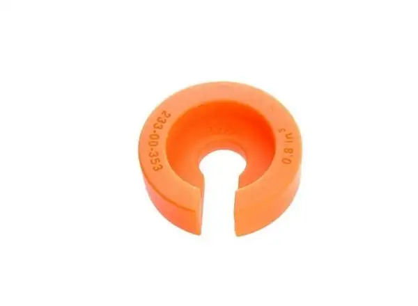 Fox spacer for volume adjustment of DPS shock chamber