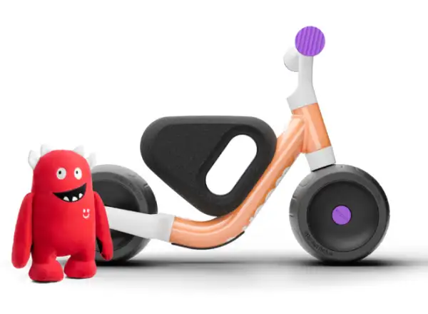 Woom WOW children's balance bike Pop Peach