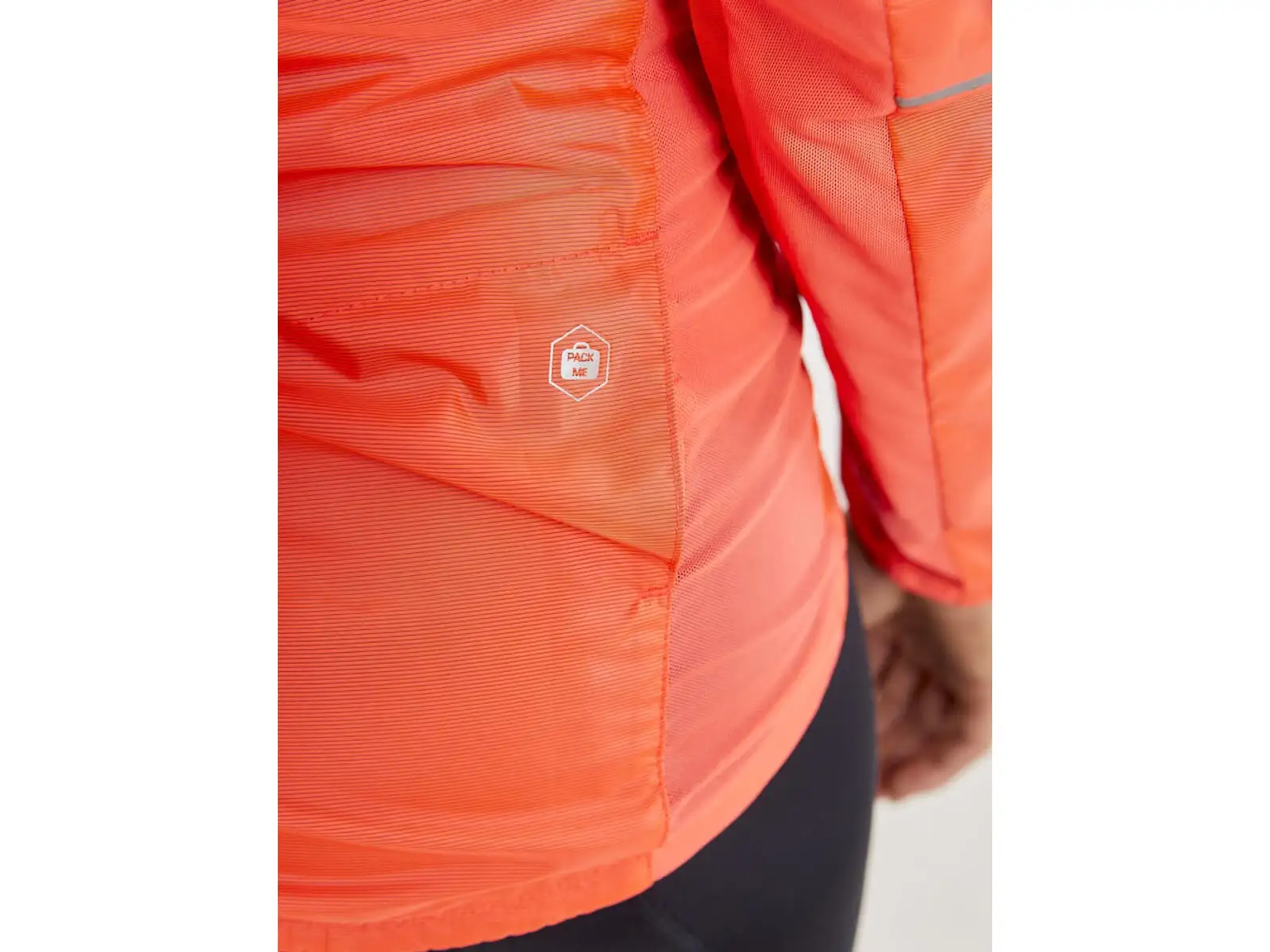Craft ADV Essence Light Wind women's cycling jacket orange