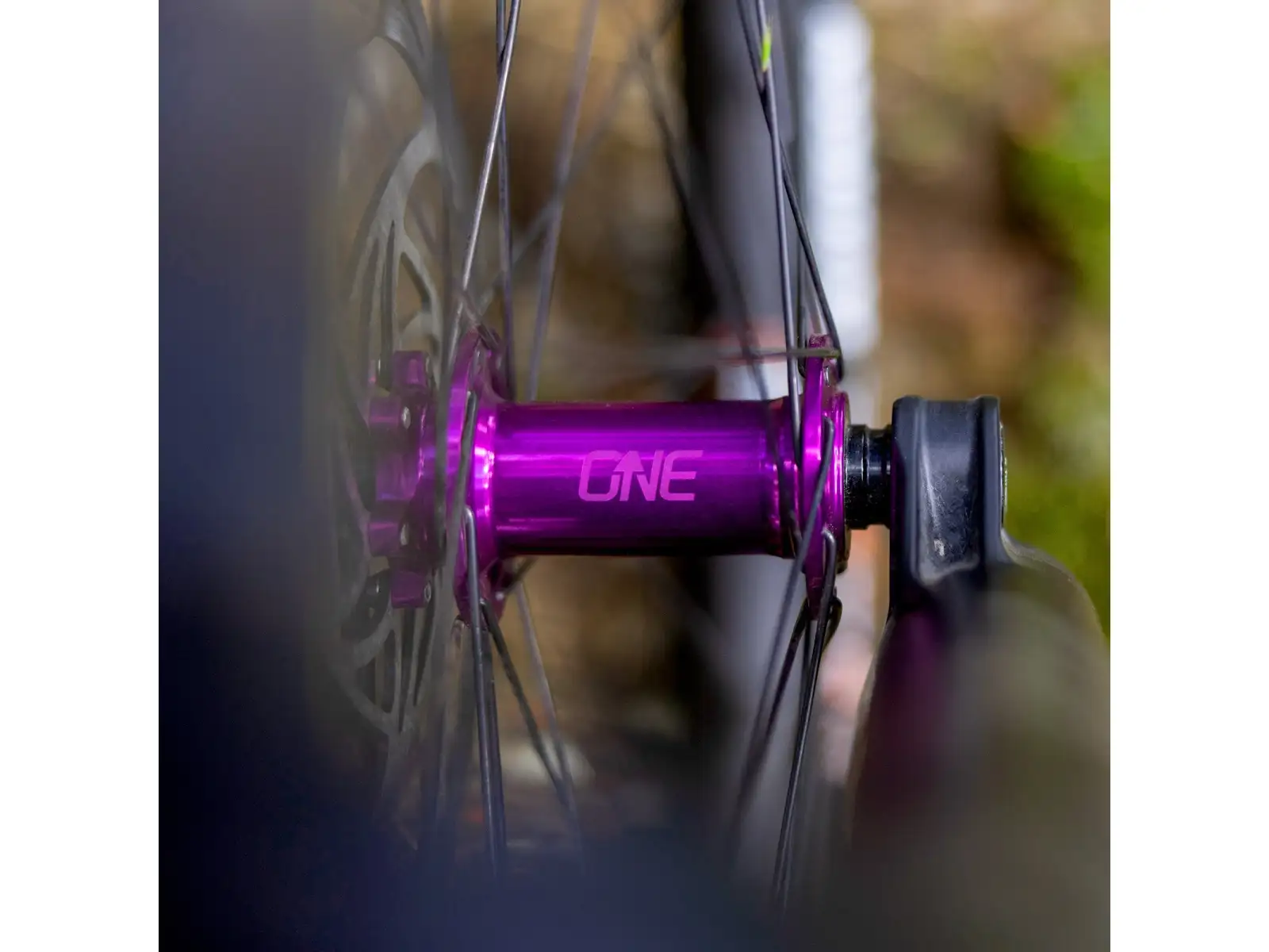 OneUp front hub 110x15 32 holes purple