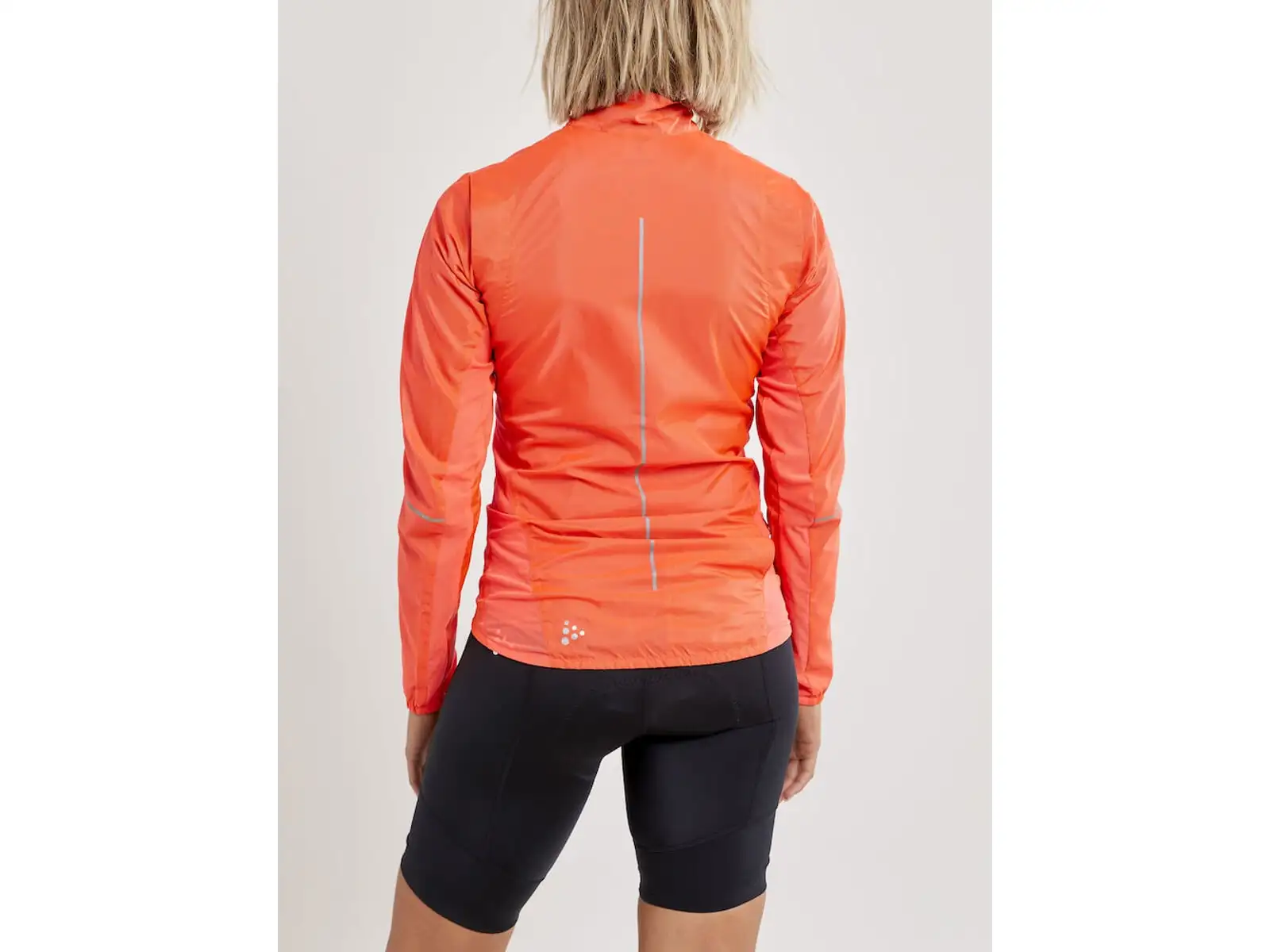 Craft ADV Essence Light Wind women's cycling jacket orange