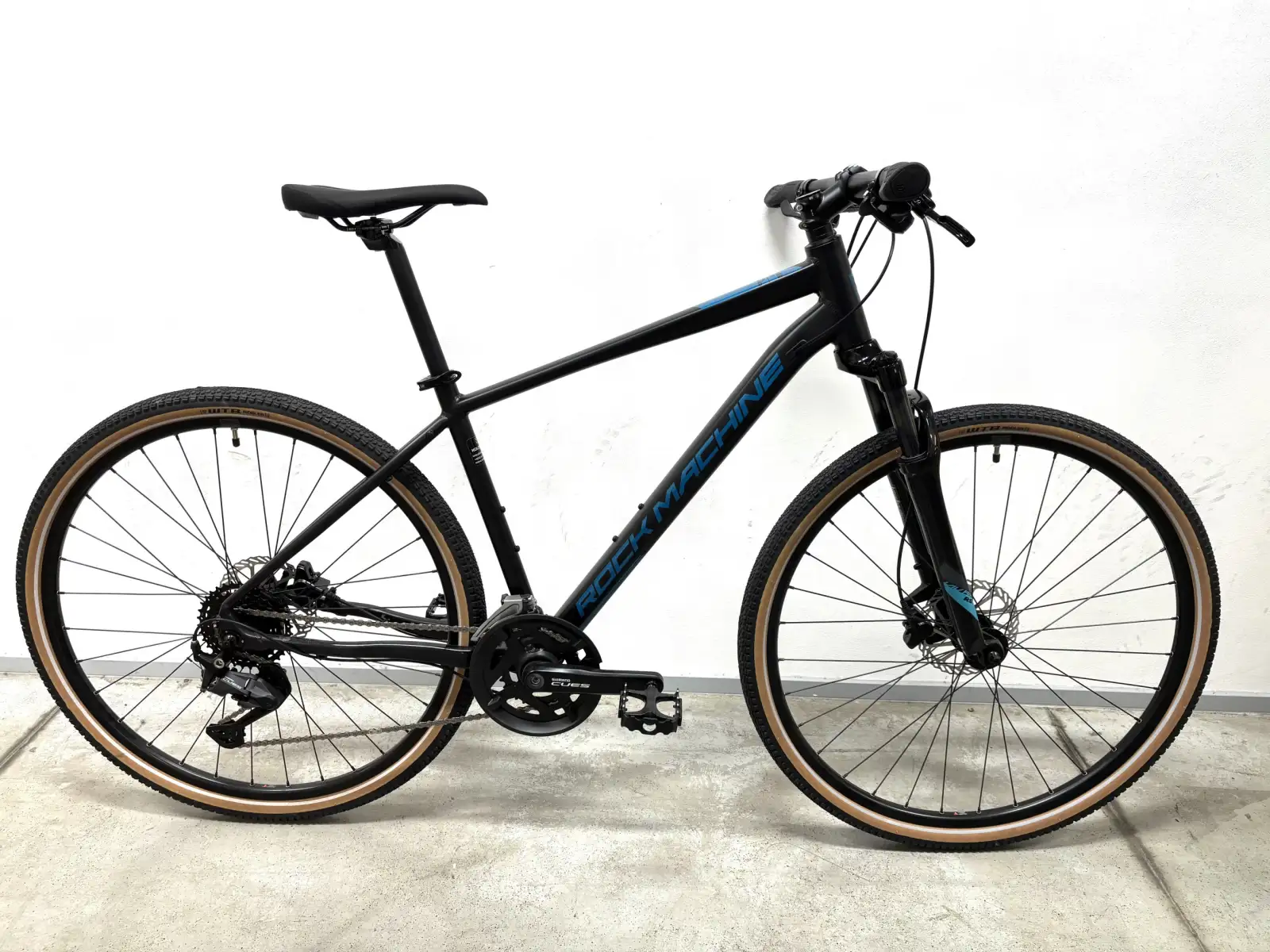 Rock Machine CrossRide 700 trekking bike black/petrol SAMPLE