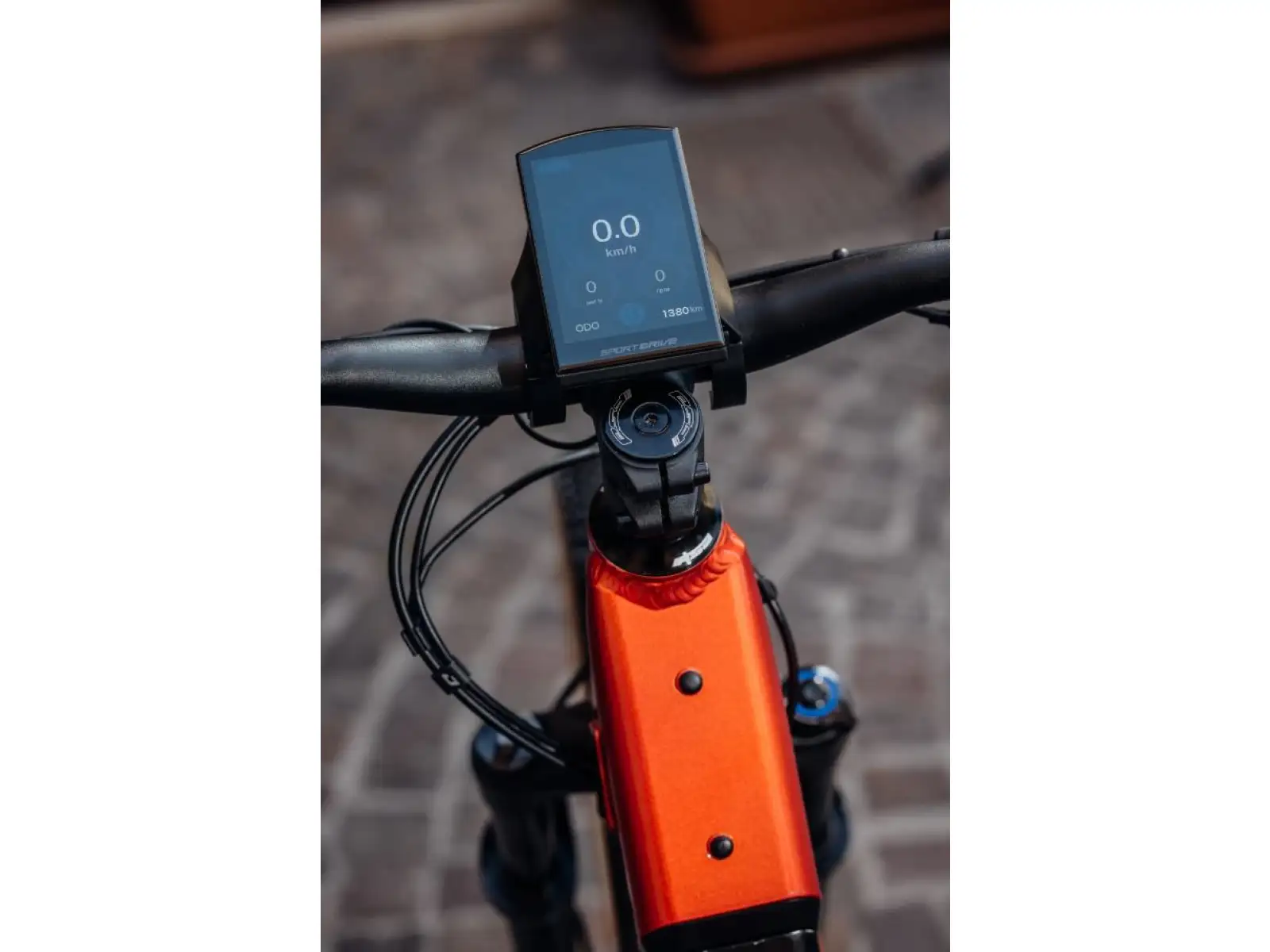Rock Machine Storm e90-29 Metallic Orange/Silver trekking low-entry e-bike