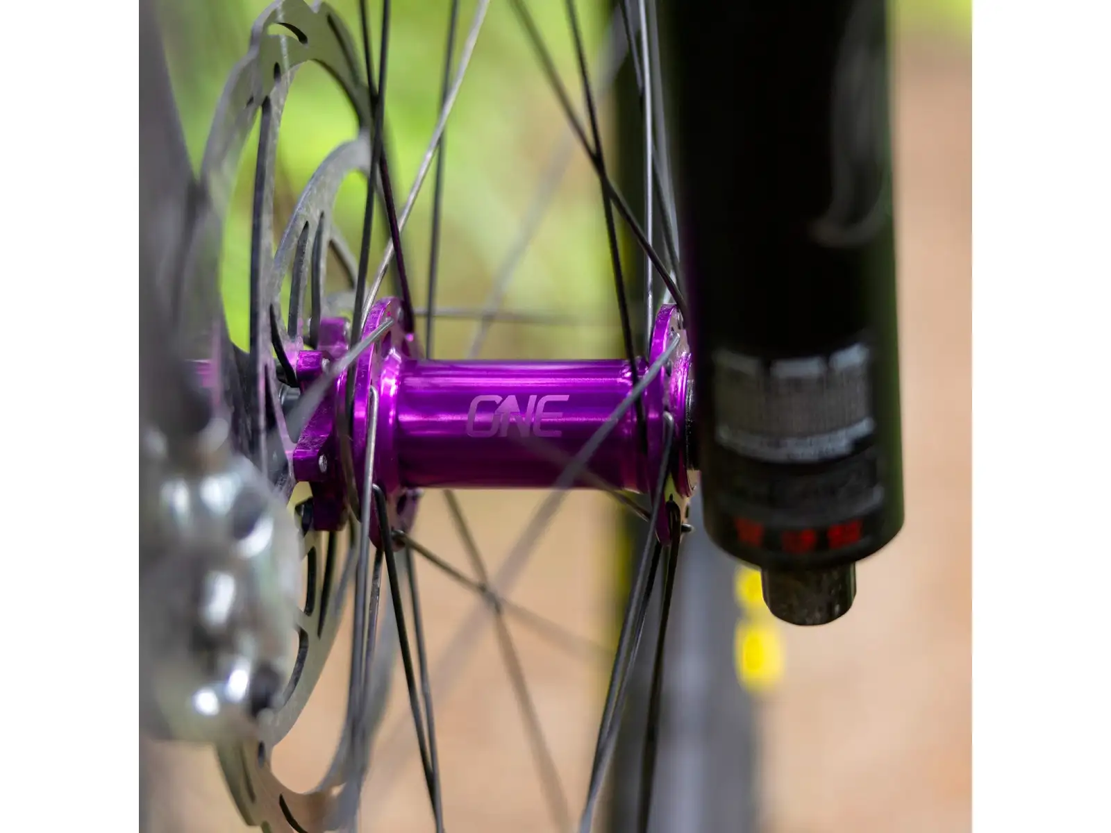 OneUp front hub 110x15 32 holes purple
